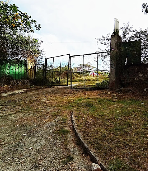 The gate leading to the grounds of Hyatt Terraces Hotel. Photo via Google Maps.